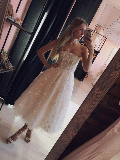 Star-Pattern A-Line Midi Dress with Embellished Belt