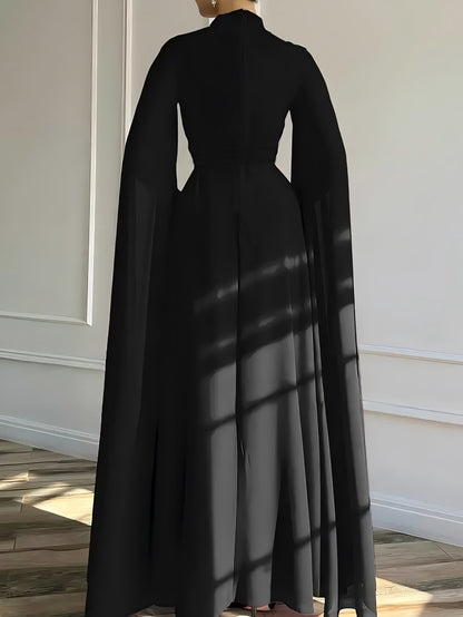 Pleated Wide Leg Jumpsuit with High Neck and Cape Sleeves