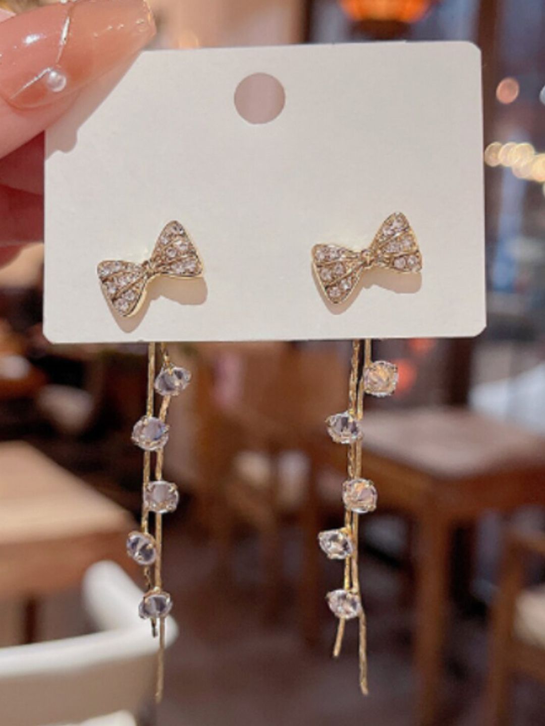 SALTY  Stone-Studded Bow Detail Tassel Drop Earrings