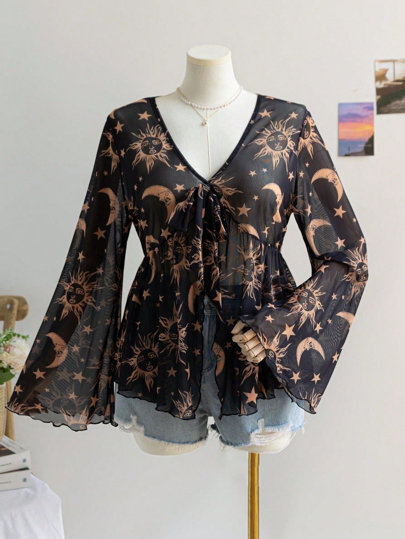 Sheer Printed V-Neck Top with Tie-Front and Bell Sleeves