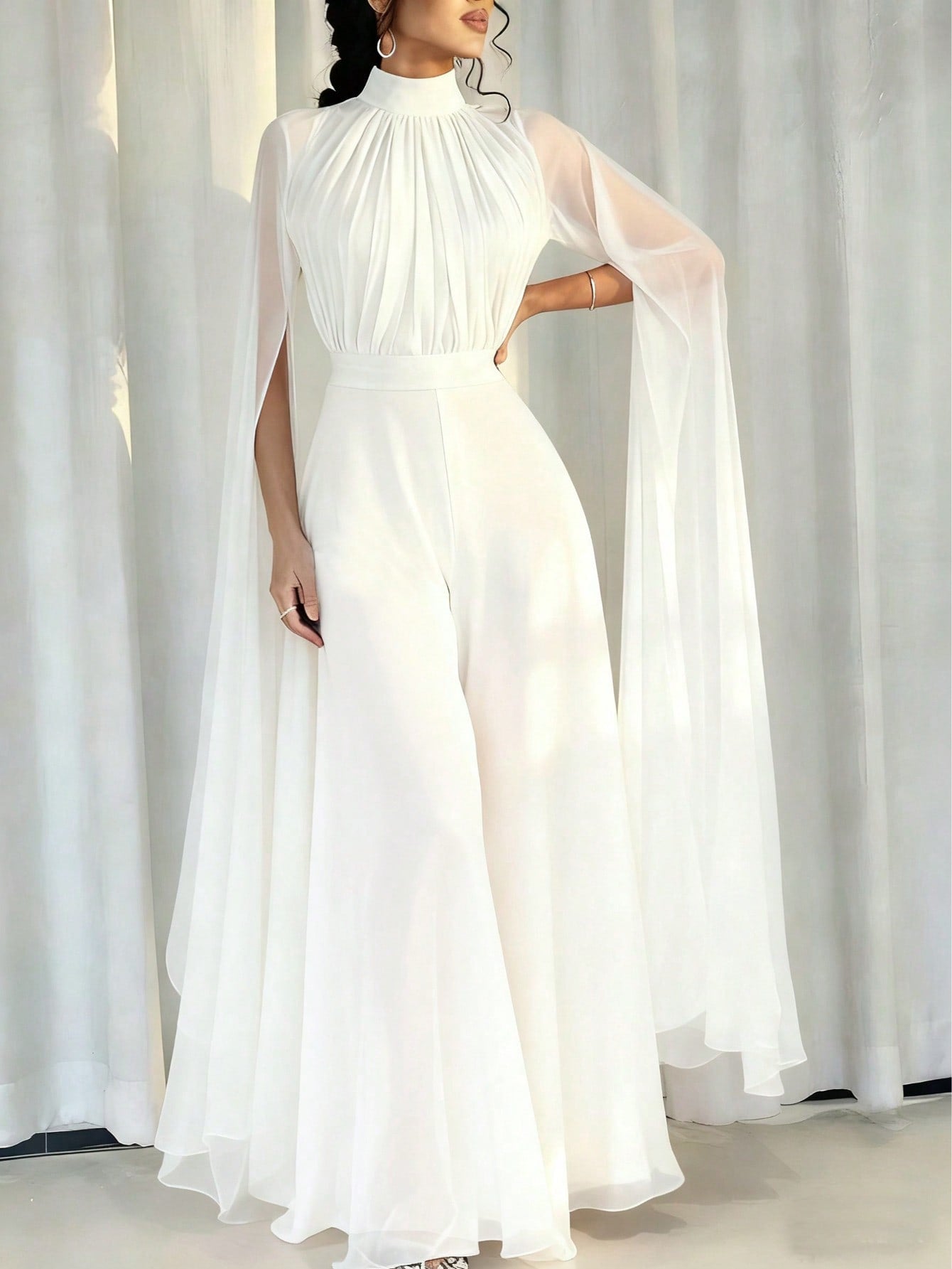 Pleated Wide Leg Jumpsuit with High Neck and Cape Sleeves