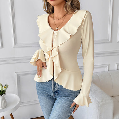 Long Sleeve Peplum Blouse with Ruffled Front and Flared Cuffs