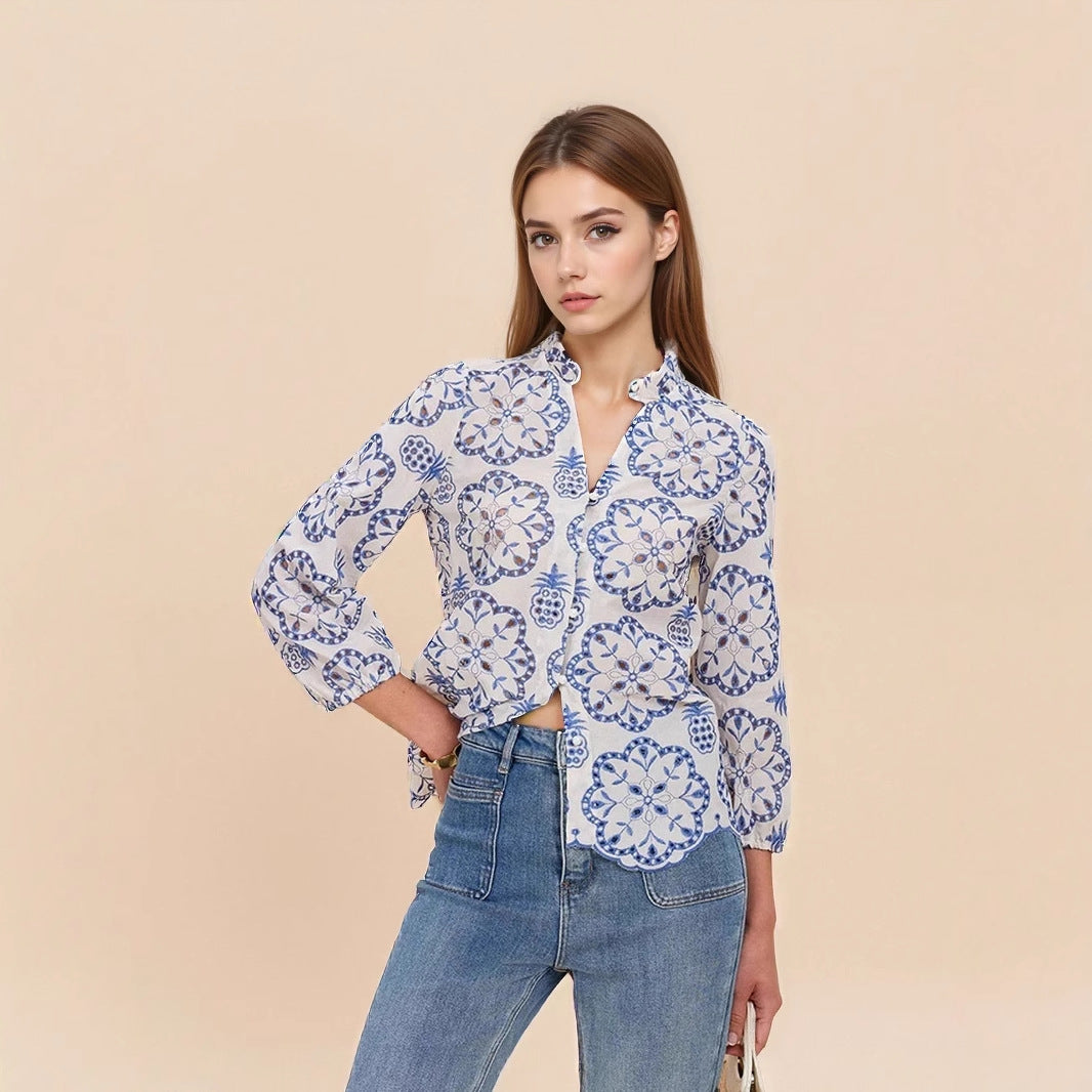 Blue and White Floral Blouse with Ruffled Collar and Scalloped Hem