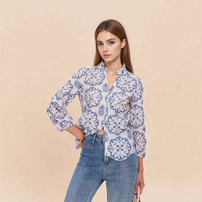 Blue and White Floral Blouse with Ruffled Collar and Scalloped Hem