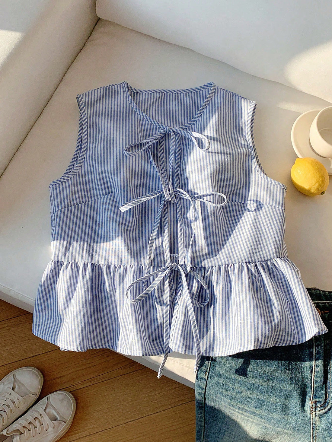 Striped Sleeveless Peplum Top with Front Bow Ties