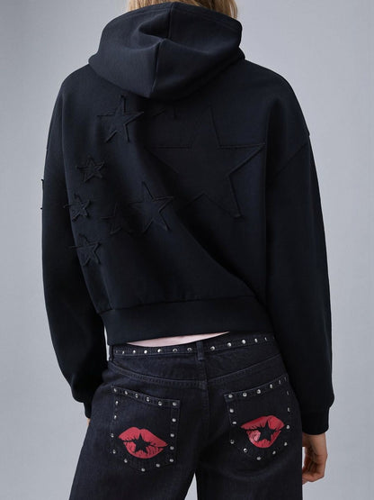Low-rise baggy studded jeans