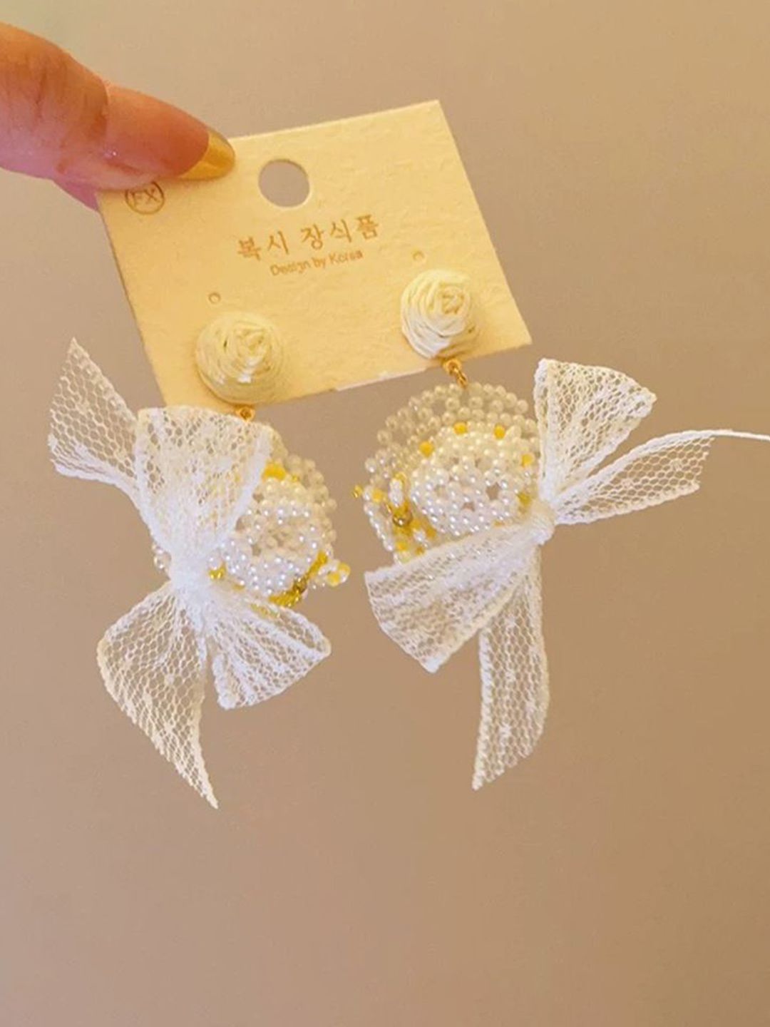 Artificial Stones Studded & Beaded Floral Shaped Drop Earrings