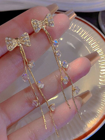 SALTY  Stone-Studded Bow Detail Tassel Drop Earrings
