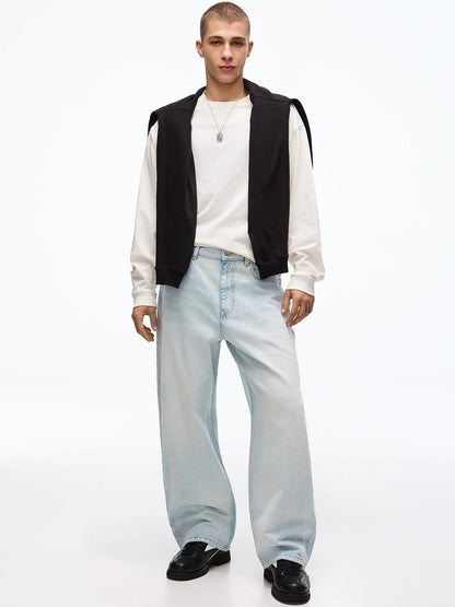 Embroidered barrel-leg jeans