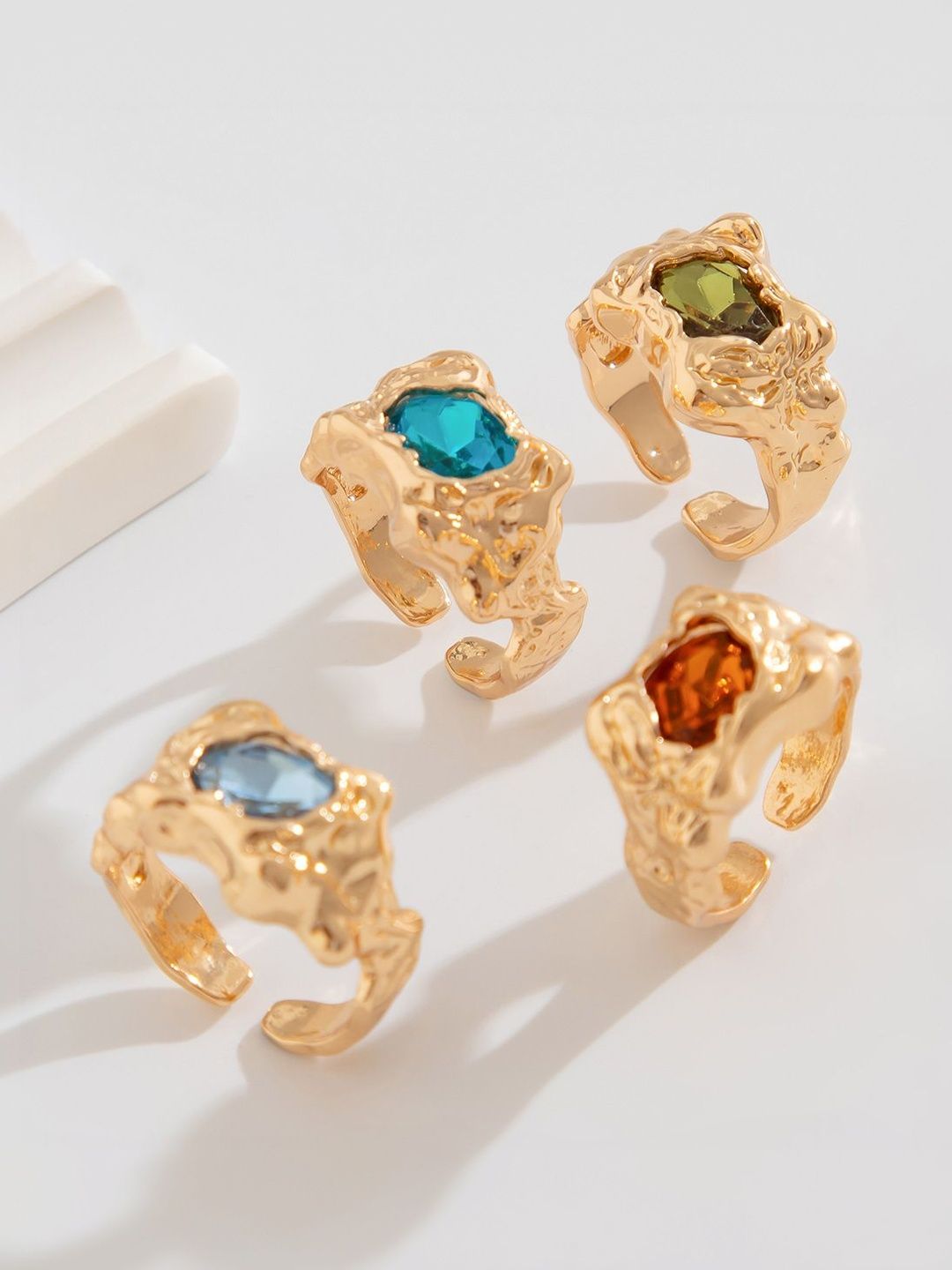 Men Set Of 4 Gold-Plated Stone-Studded Finger Ring
